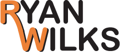 Ryan Wilks logo in orange and black font